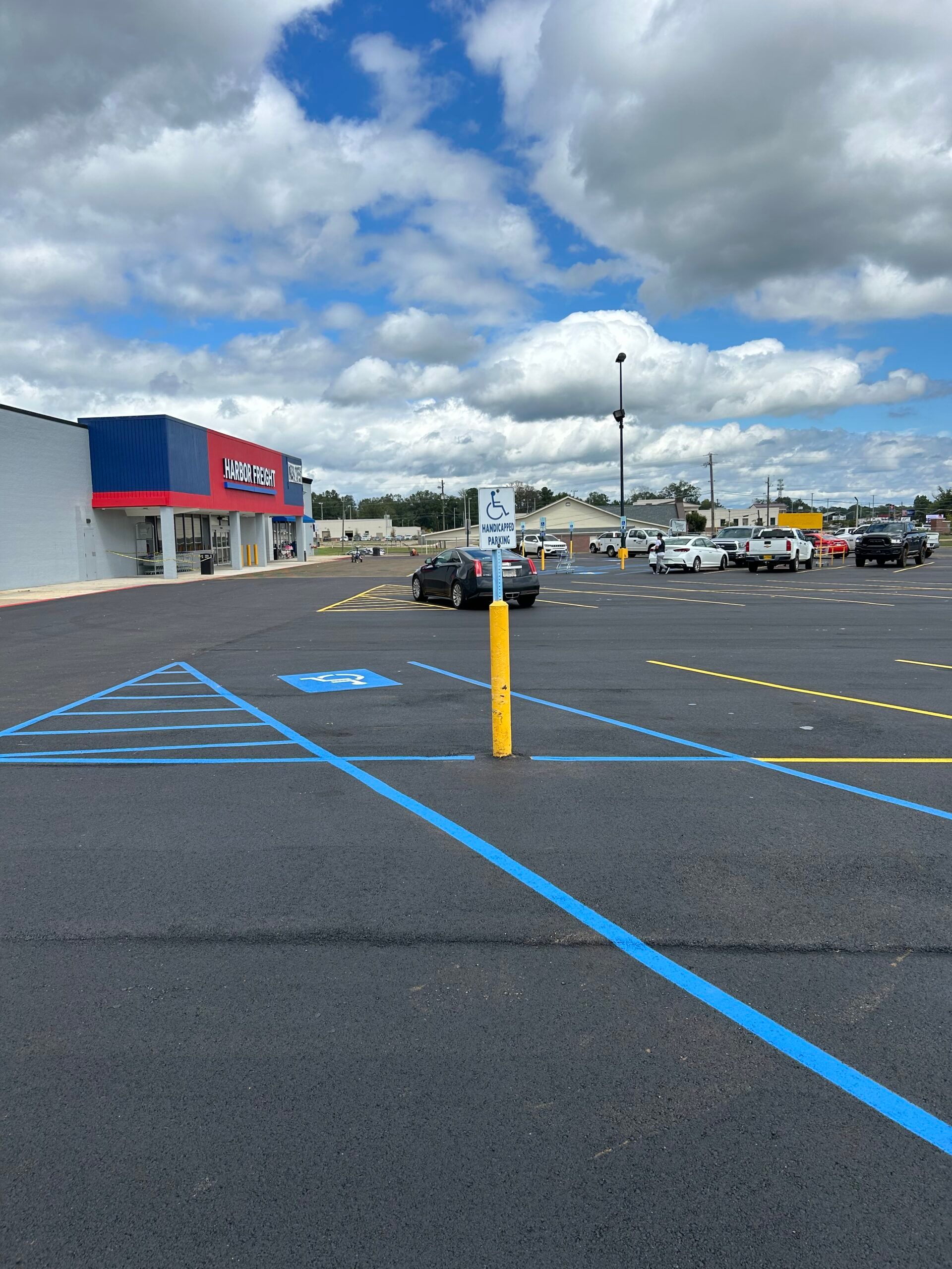 Asphalt parking lot with new line striping