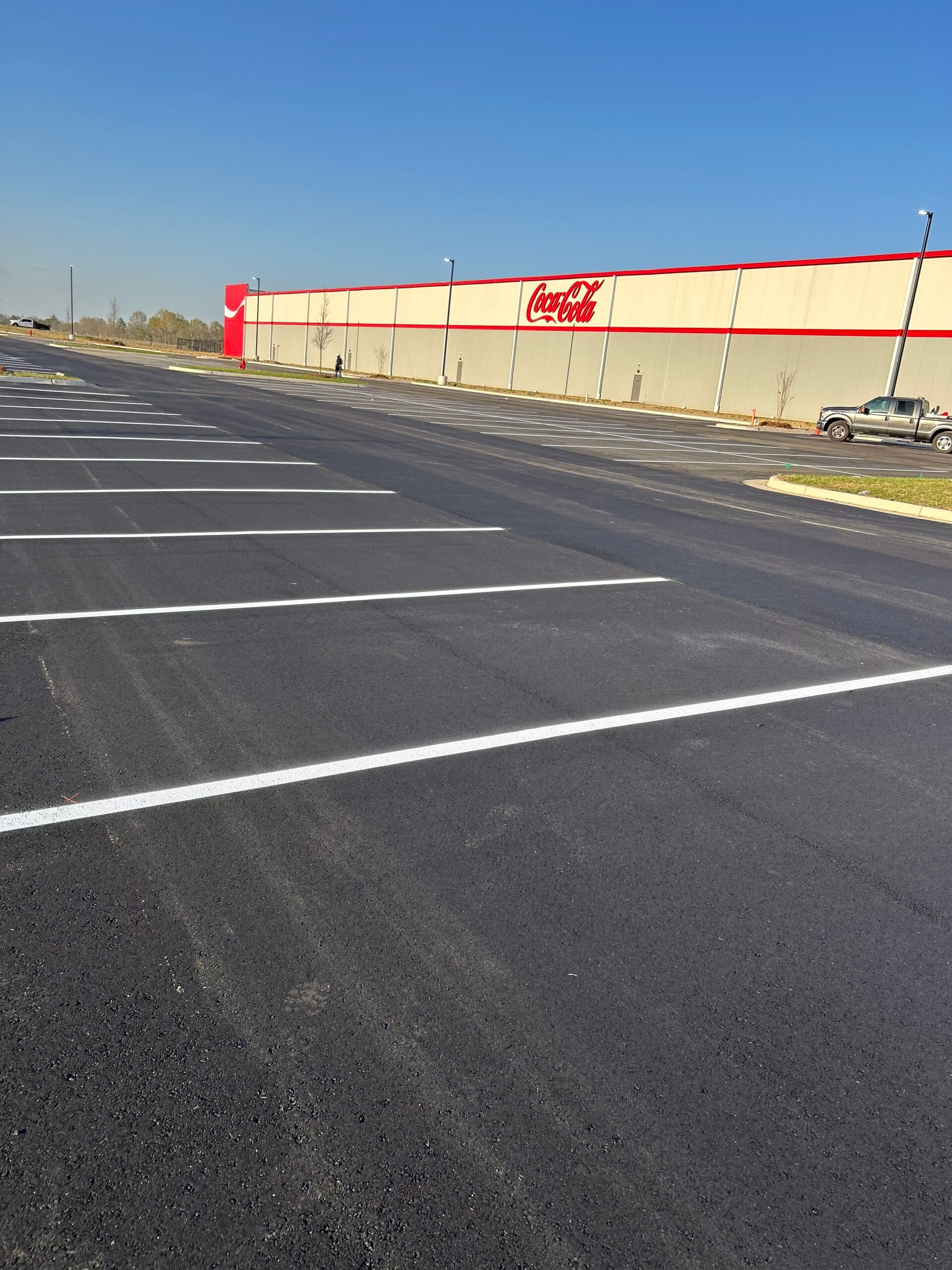 Freshly paved and striped commercial parking lot