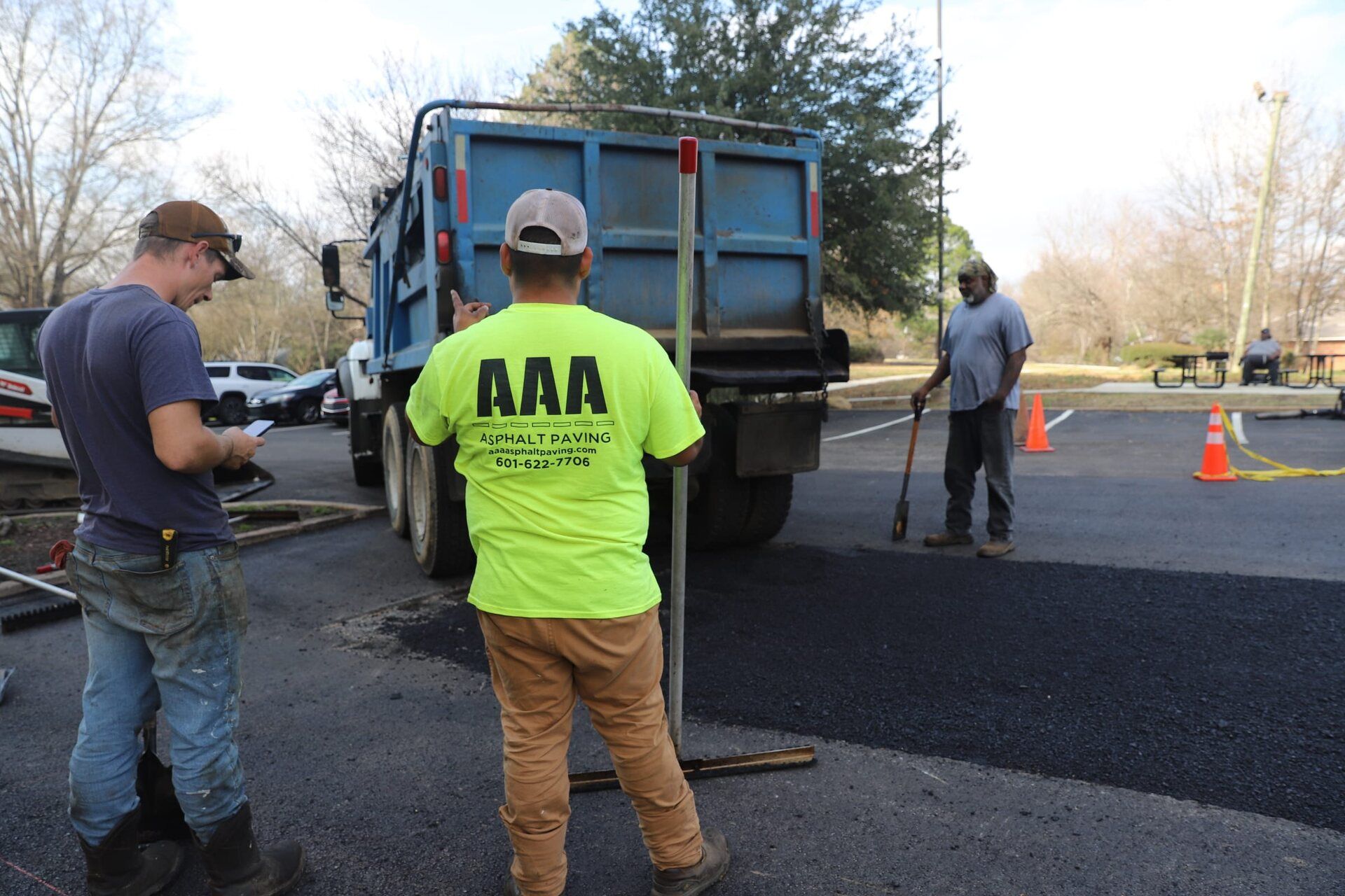 AAA Asphalt Paving crew performing asphalt repairs